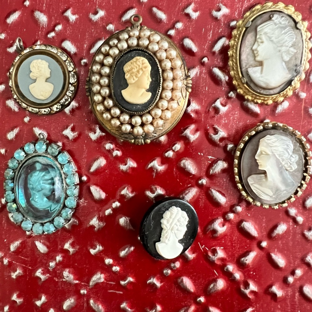 Antique Locket with pictures. 3 locket charms and 3 brooches.